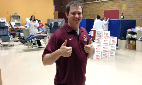 Cobber assistant football coach Brian Mistro helped organize the first-ever Cobber athletics blood drive.