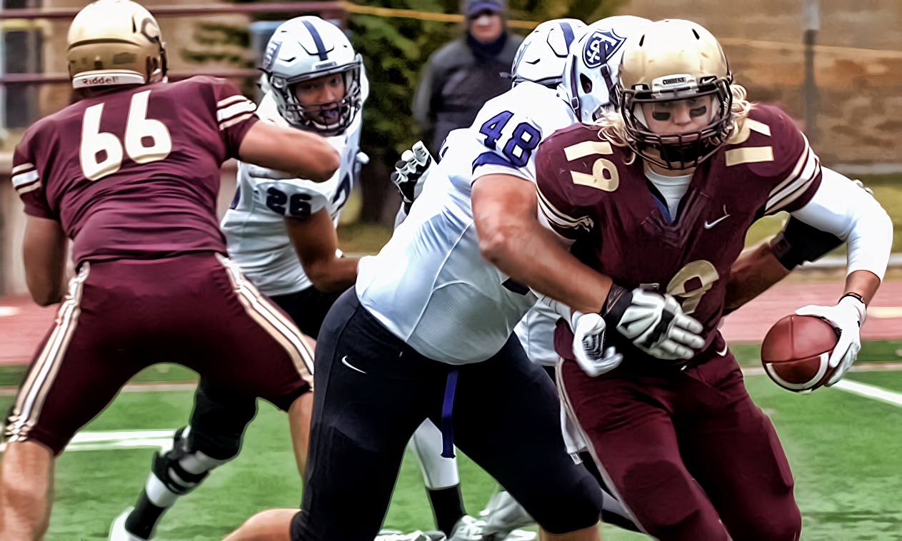 Cobber quarterback Michael Herzog tries to escape the rush of the St. Thomas defense in Concordia's loss to the No.6-ranked Tommies on Halloween.