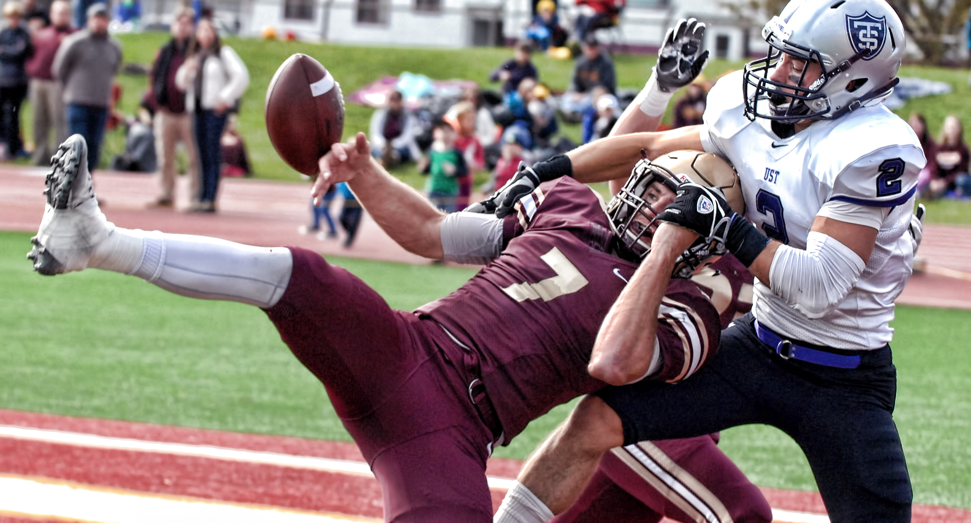Junior defensive back Dallas Raftevold tries for the interception during the Cobbers' thrilling Homecoming game with  #4 St. Thomas.