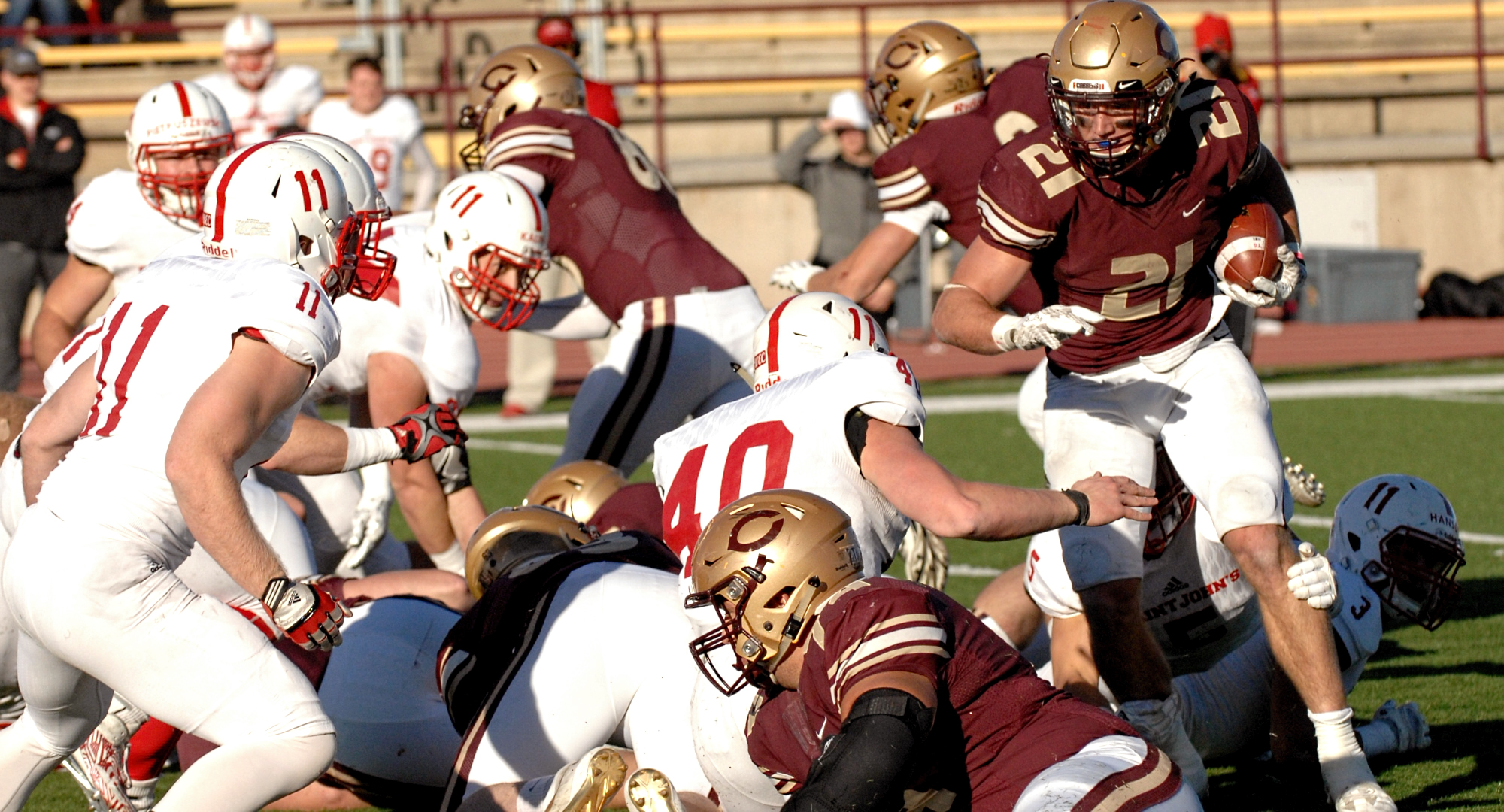 Junior Chad Johnson weaves his way through the defense in the Cobbers' regular-season finale. He finished with 103 rushing yards.