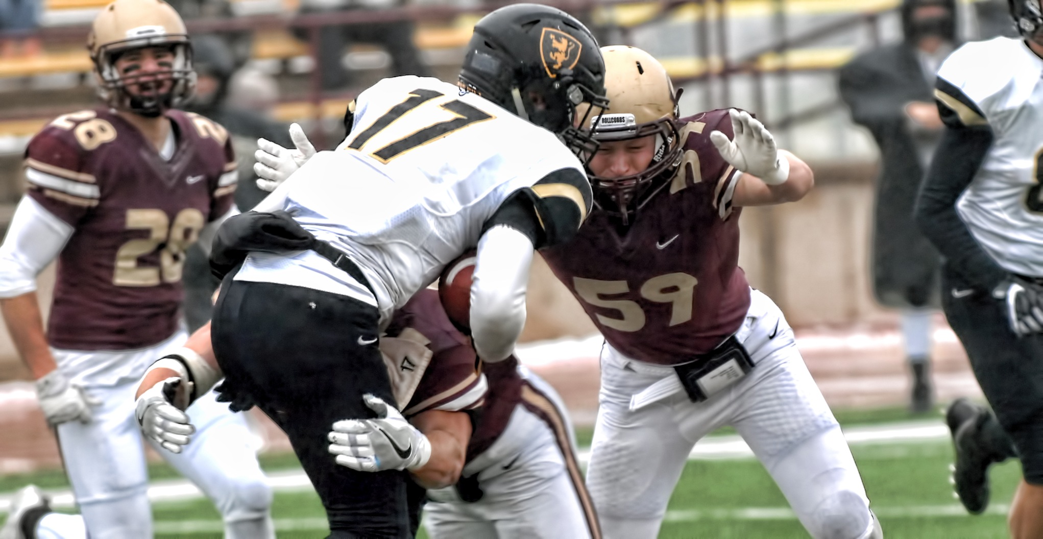 Junior linebacker Alex Berg gets set to help with a tackled during the Cobbers' 54-12 win over St. Olaf.
