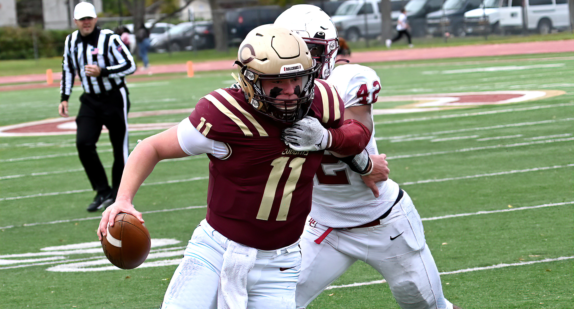 Cooper Mattern shakes off a Hamline tackler in the second half of the Cobbers' win over the Pipers. Mattern threw for a school-record 401 yards.