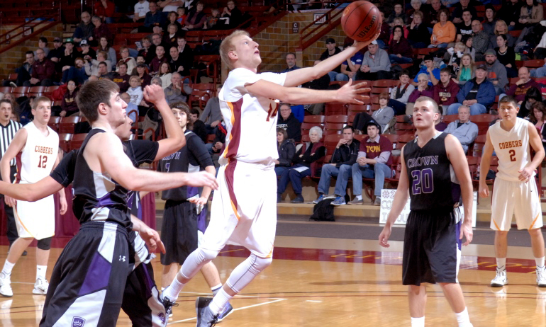 Cobber junior guard Corey Abbas goes in for the lay-up during Concordia's 86-58 win over Crown.