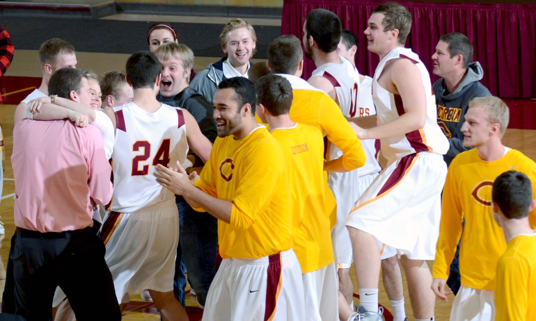 Fans celebrate with members of Concordia after the Cobbers' upset win over No.2-ranked St. Thomas.