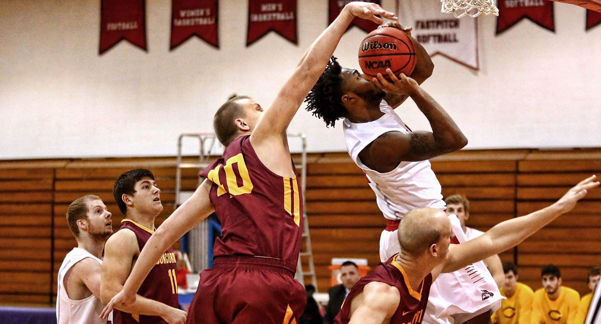 Junior Austin Heins goes for the block in the Cobbers' win at St. Mary's. Heins had 13 points in the team's third win of the year. (Photo courtesy of Ryan Coleman, D3photography.com)