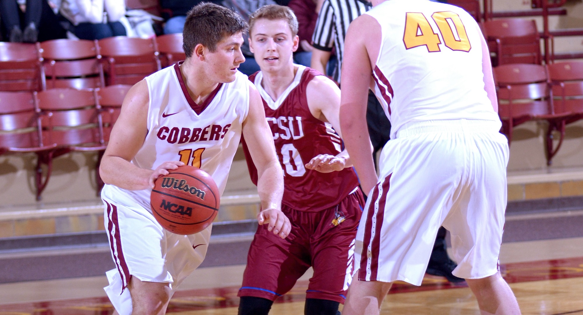 Senior Dylan Alderman drives to the basket in the Cobbers' overtime win against Valley City State. Alderman tied his career high with 27 points.