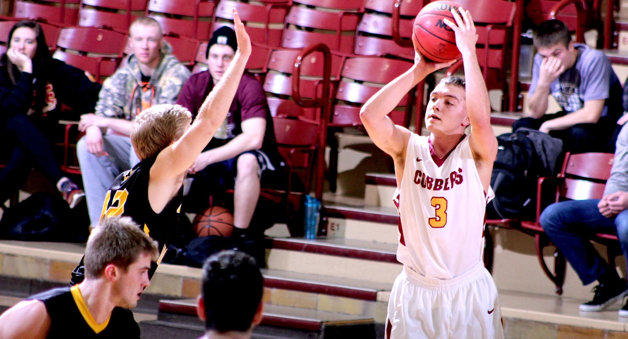 Zach Kinny gets ready to knock down one of his six 3-pointers against Gustavus. He went 8-of-12 from the floor, including 6-for-8 from beyond the arc and scored a career-high 24 points.