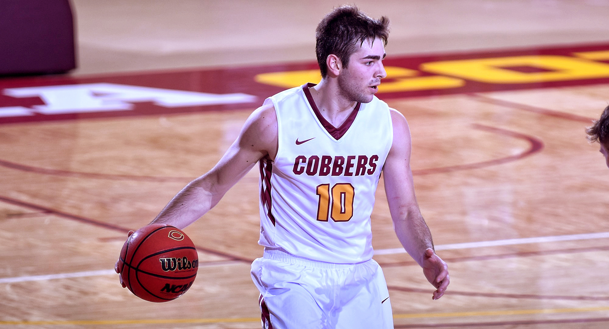 Junior Tommy Schyma put up game-high totals in points and rebounds and hit the game-winning 3-point shot in the Cobbers' victory at St. Olaf.