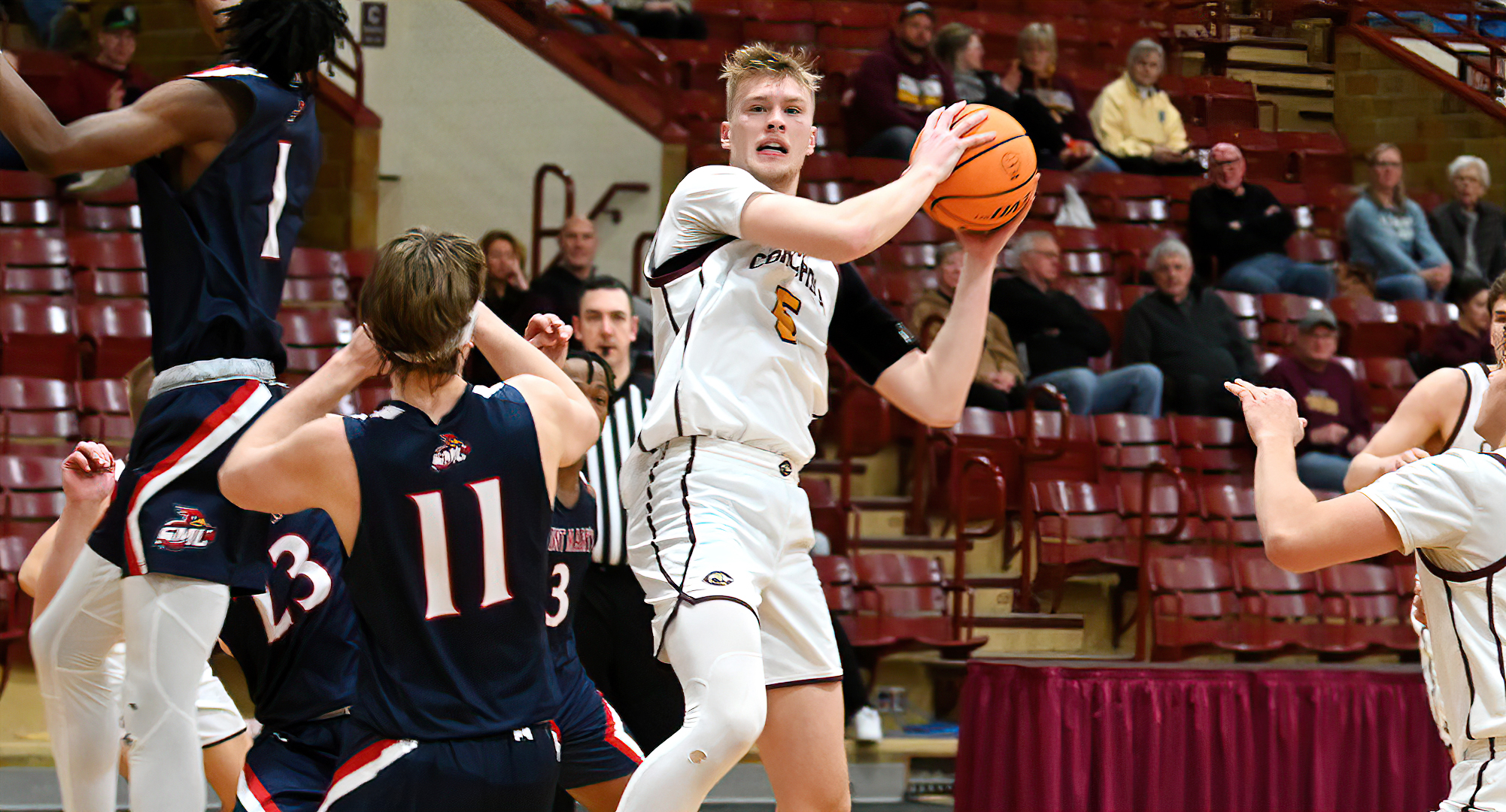 Junior Noah Christensen grabs one of his career-high 11 rebounds in the Cobbers 72-58 win over St. Mary's.
