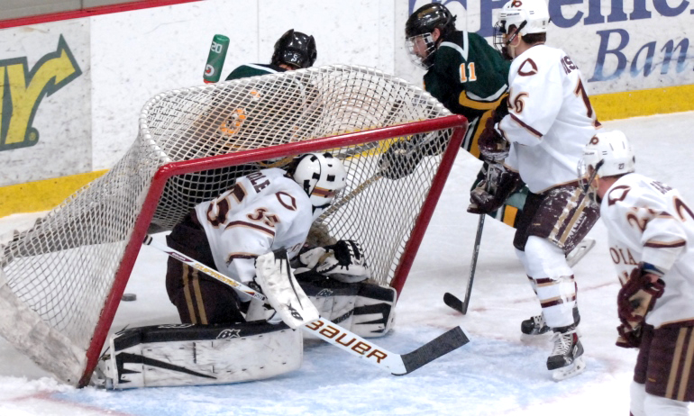 Cobber goalie Alex Reichle gets caught in the goal during the first period of the Cobbers' thrilling game with #2 St. Norbert.