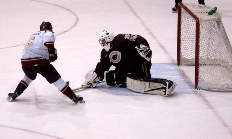 Cobber goalie Alex Reichle makes the winning save in the shootout vs. No.2-ranked Norwich. (Photo courtesy of Bruce Post)