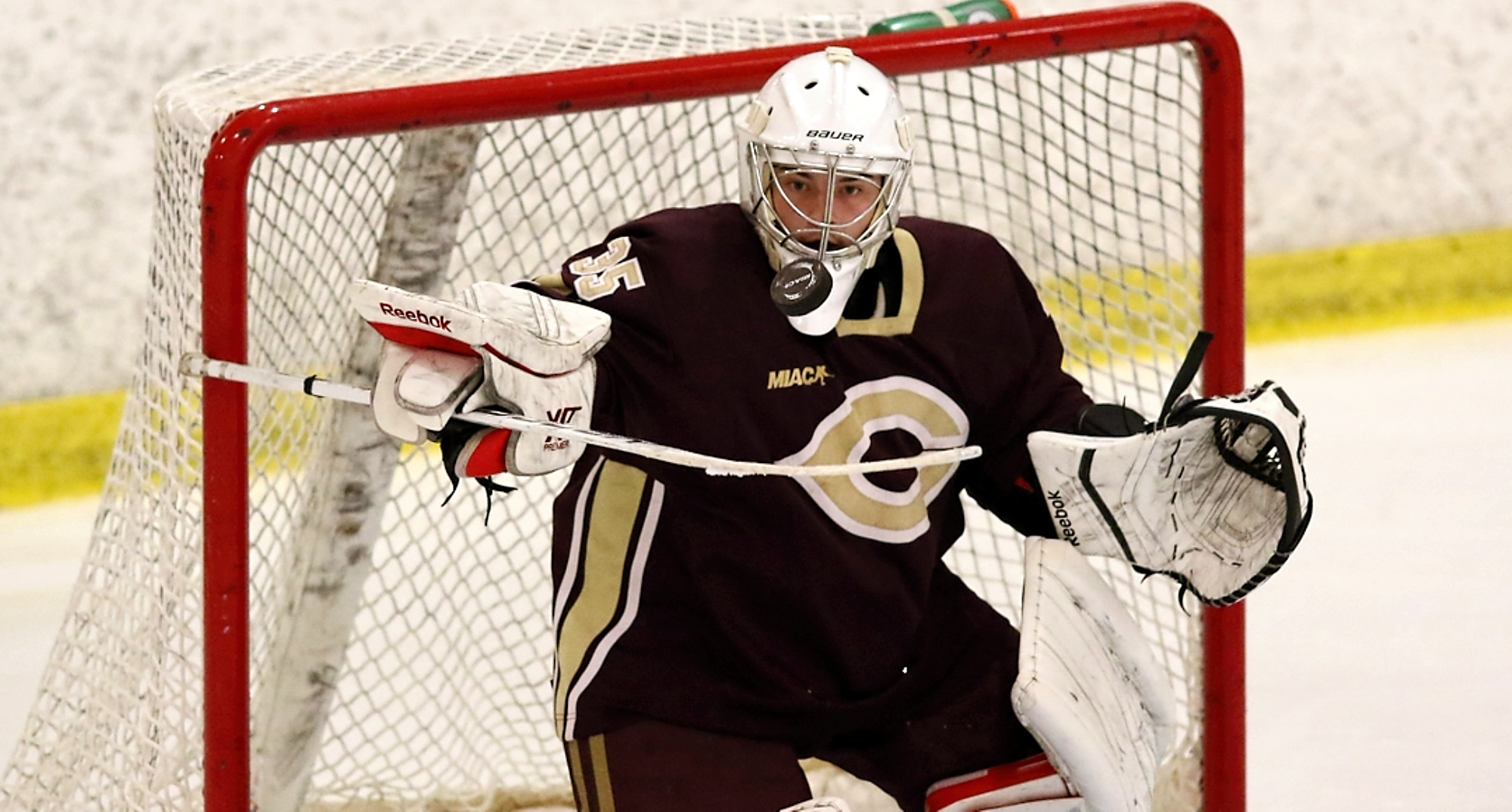 Sam Nelson makes one of his 74 saves in the Cobbers' sweep at St. Mary's over the weekend. (Photo courtesy of Ryan Coleman, d3photography.com)