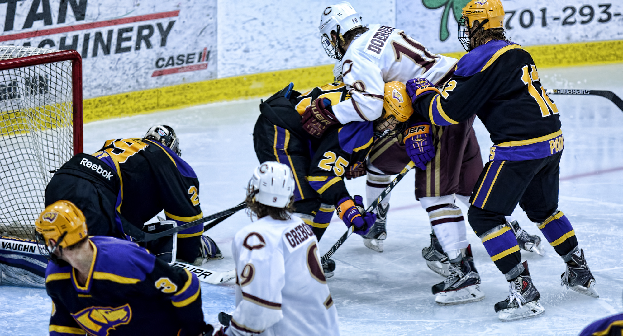 Zach Doerring (far) and Jon Grebosky each had a point in the Cobbers' thrilling 3-2 loss at No.5-ranked Wis.-Stevens Point.