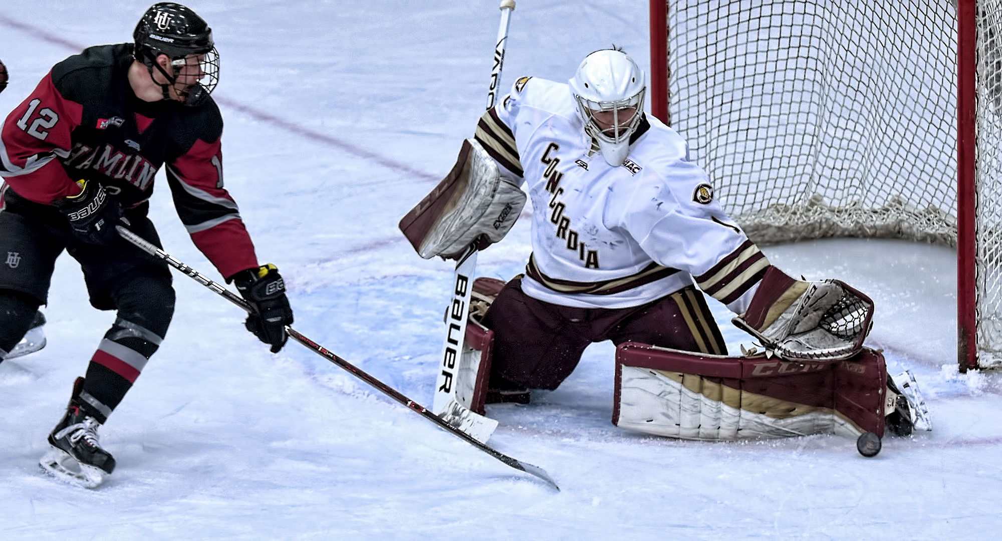 Junior goalie Jacob Stephan makes one of his 34 saves in the Cobbers' 5-1 win over Hamline. Stephan is now fifth in the nation in GAA and fourth in save percentage.