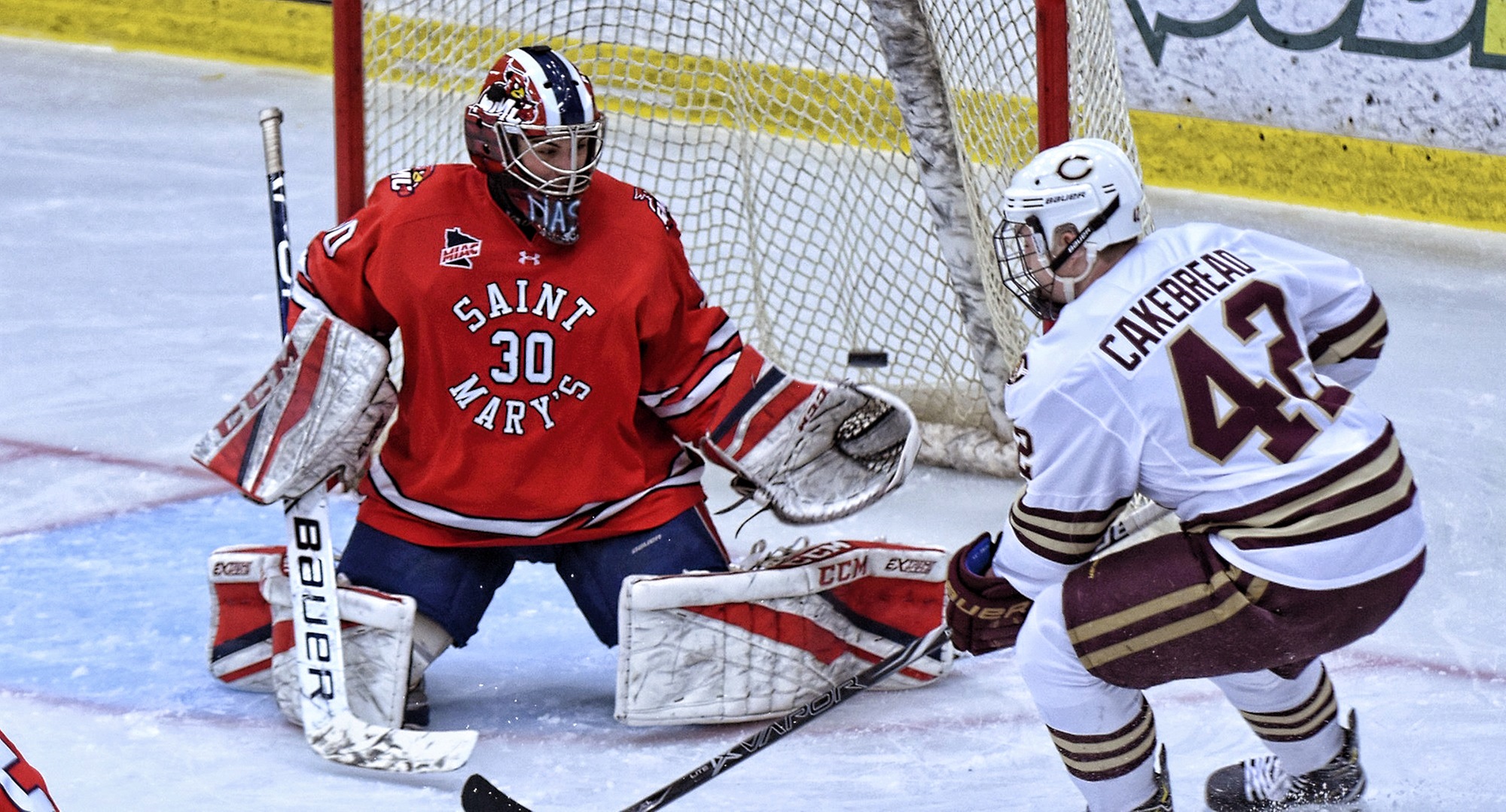 Junior Christian Cakebread watches Alex Stoley's shot elude the St. Mary's goalie to give the Cobbers a 2-1 lead in the third period of the MIAC opener.