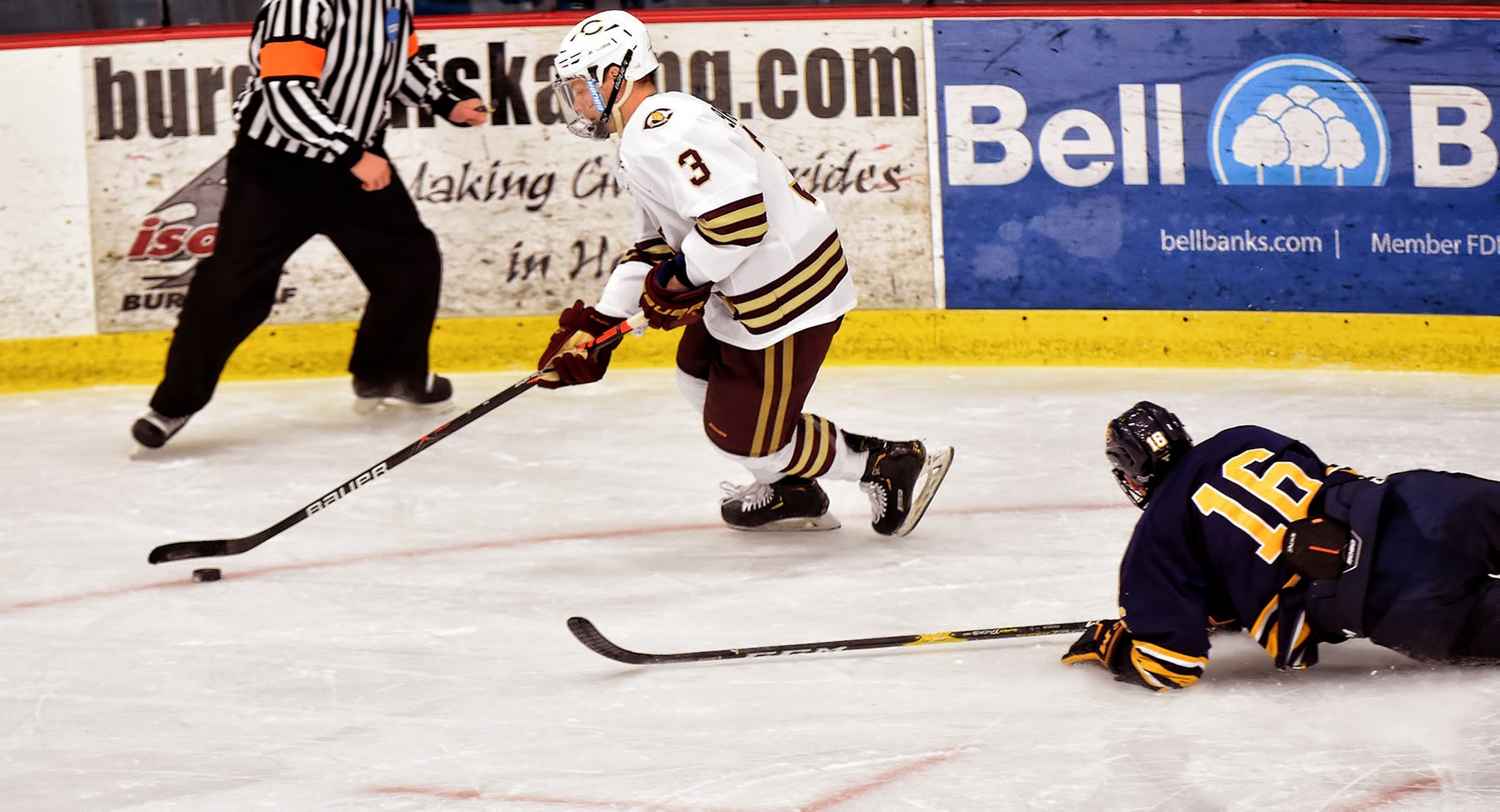 Junior Kyle Siemers eludes a Wis.-Eau Claire defender during the second period of the Cobbers' game with the Blugolds. Siermers scored both goals for the Cobbers.