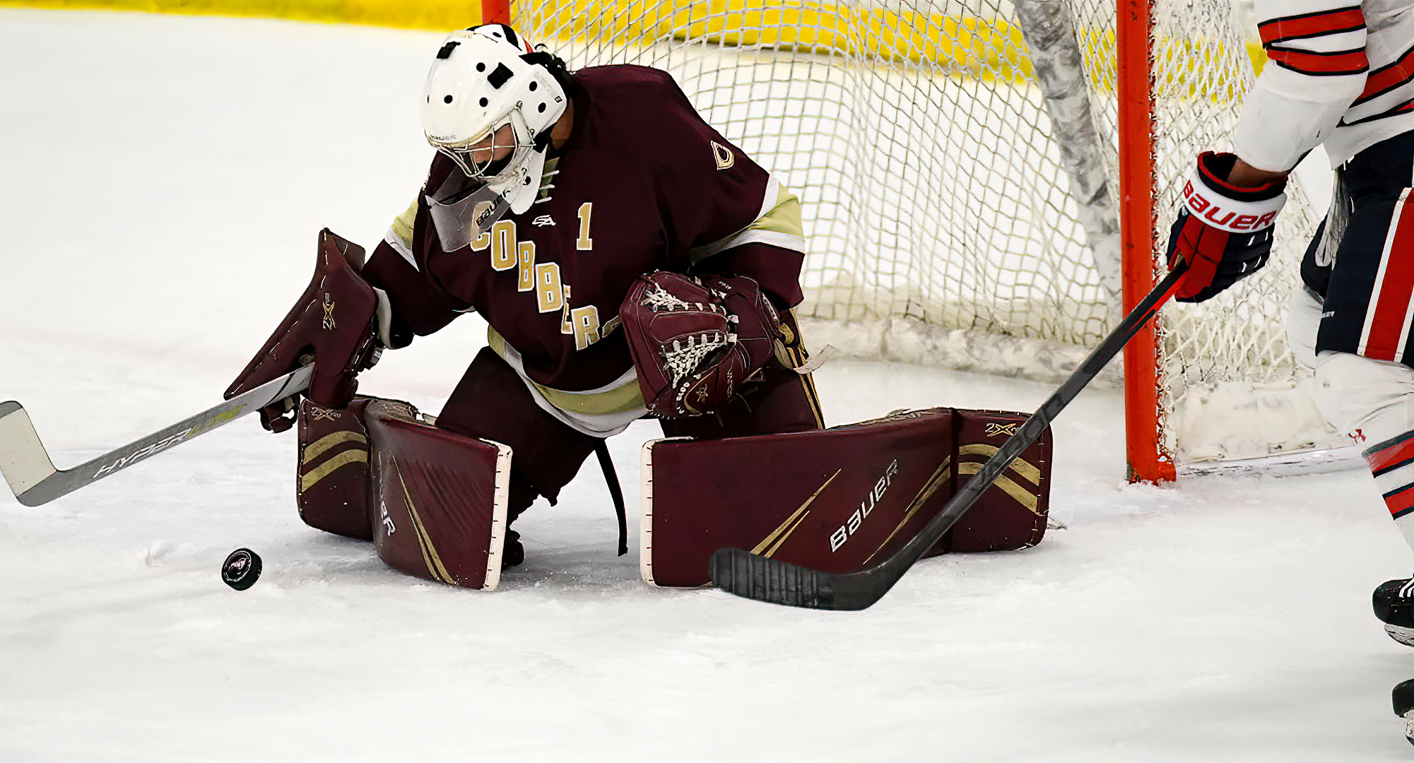 Matt Fitzgerald makes one of his 68 saves in the Cobbers' sweep at St. Mary's. Fitzgerald is 7-2-1 in the last 10 games. (Photo courtesy of SMU SID)