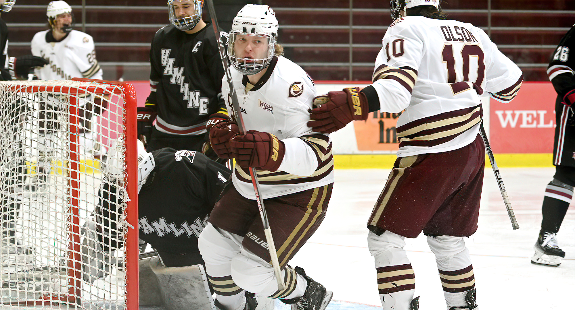 Isaac Henkemeyer-Howe turns to celebrate his second-period goal in the Cobbers 3-1 non-conference wing against Hamline.