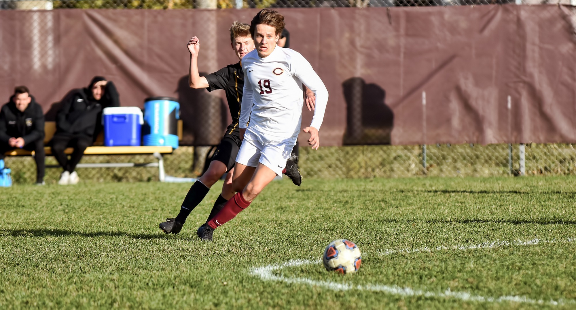 Freshman Sondre Rygg chases the ball in the middle of the field during the second half of the Cobbers' game with Gustavus.