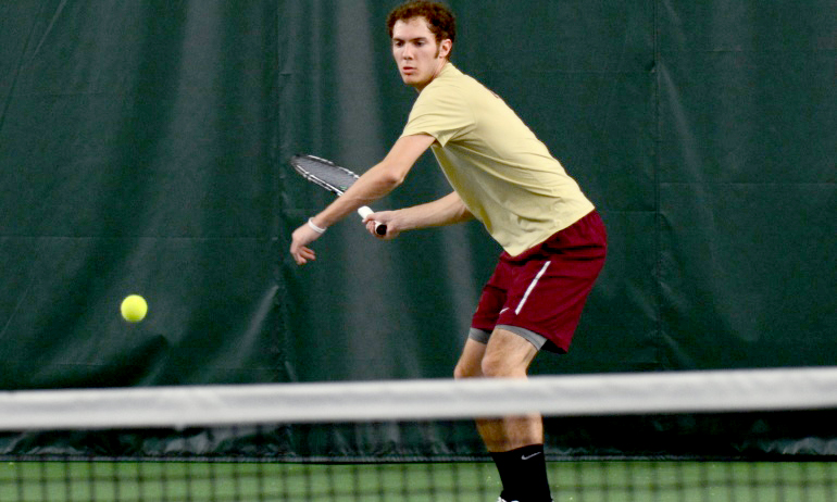 Freshman Davis Schneck gets ready to hit a forehand. He won 6-1, 6-4 at No.3 singles in his first collegiate team dual match.