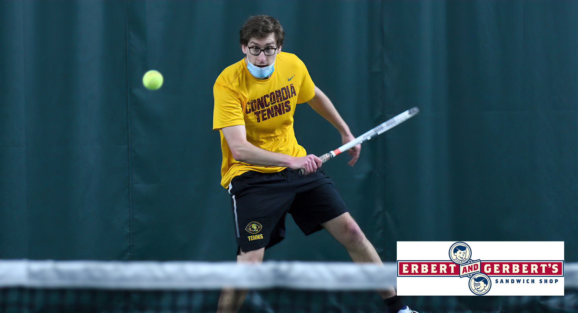 Senior Jake Peters eyes his return as it sails down the line during his 5-7, 6-3, 11-9 at No.6 singles against St. John's on Saturday.