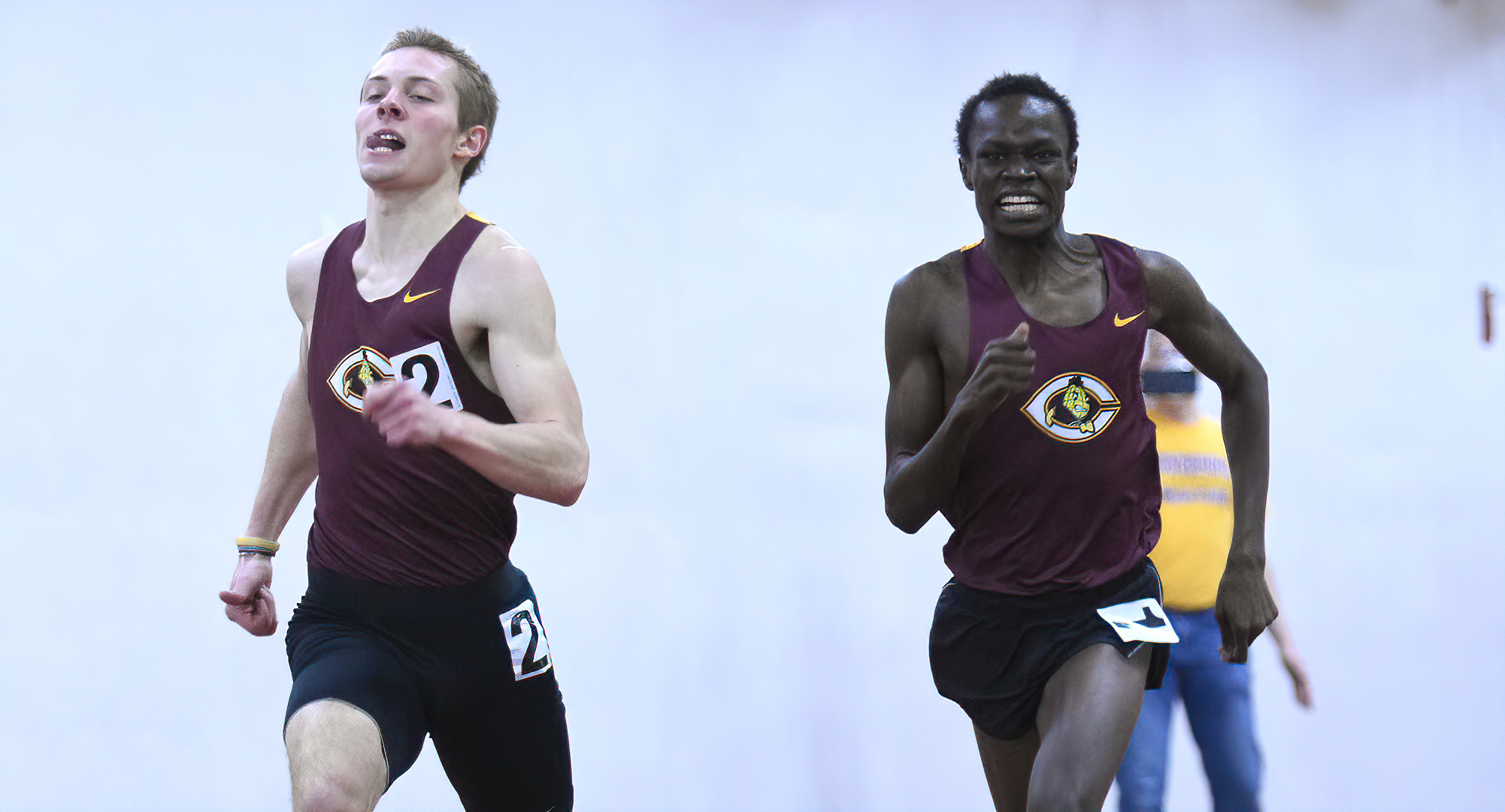 Senior All-Americans Jesse Middendorf (L) and Munir Isahak sprint towards the finish in the 1000 meters at the season-opening Cobber Open.