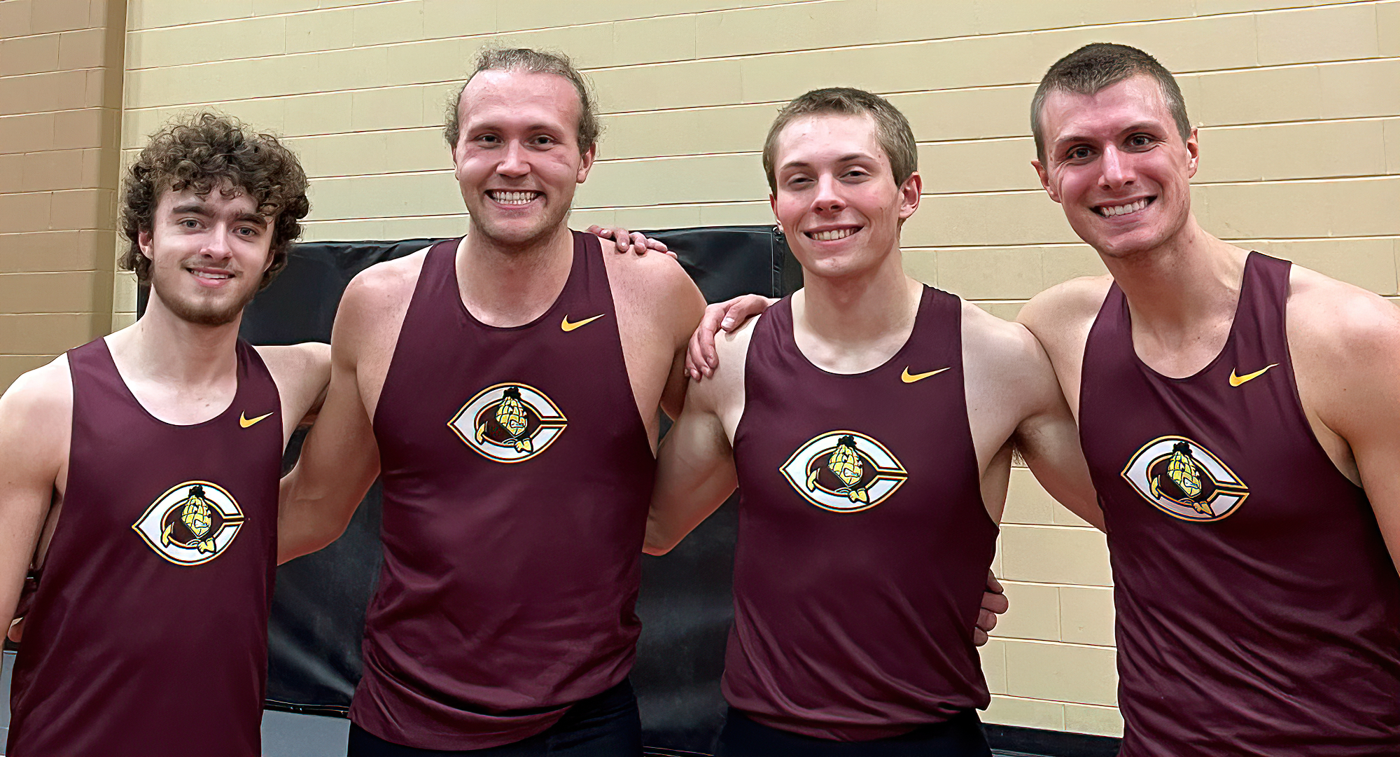 The 4x400-meter relay team of (L-R) Tommy Kern, Colin Schuller, Jesse Middendorf and Cal Wright broke the school record and qualified for nationals.