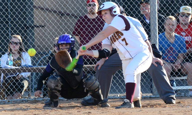 Sophomore Dominique Giesen hammers a double in the second inning of the second game in the Cobbers' home opener.