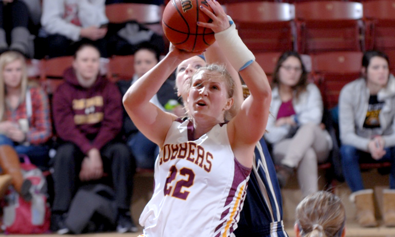 Junior Olivia Johnson goes inside for two of her 13 points in the Cobbers' comeback win against Bethel.