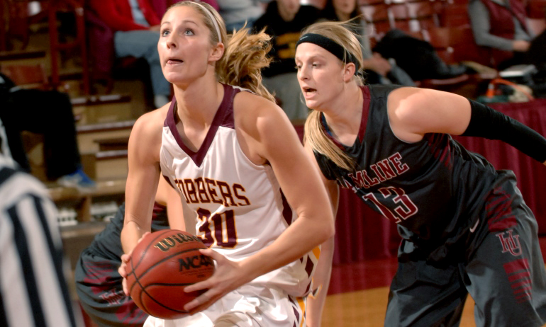 Senior Erin Januschka drives to the basket for two of her 17 points in the Cobbers' eight-point win over Hamline.