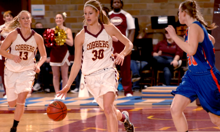 Senior Erin Januschka leads the break up the floor in the Cobbers' win over Macalester. Januschka had a game-high 14 points.