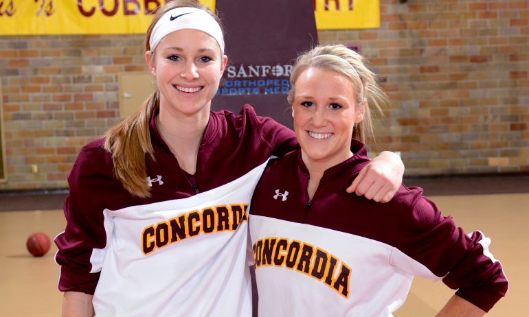 Seniors Erin Januschka (L) and Alley Fisher led by example in the Cobbers' regular-season finale win over Augsburg.