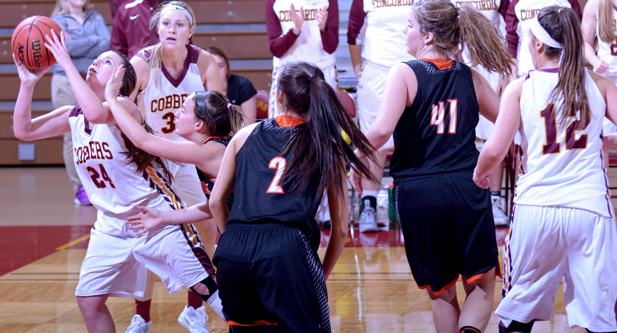 Junior Cassidy Rahman grabs one of her team-high rebounds in the Cobbers' home opener against Jamestown.