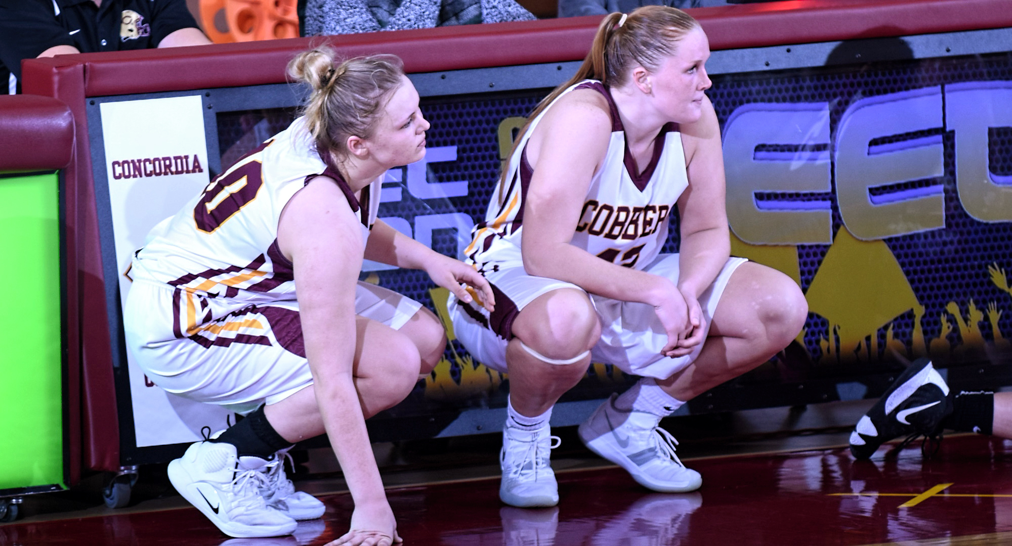 Kirstin Simmons (R) and Mira Ellefson combined for 25 points and helped the Cobbers outrebound Hamline 39-25 in their conference-opening win.
