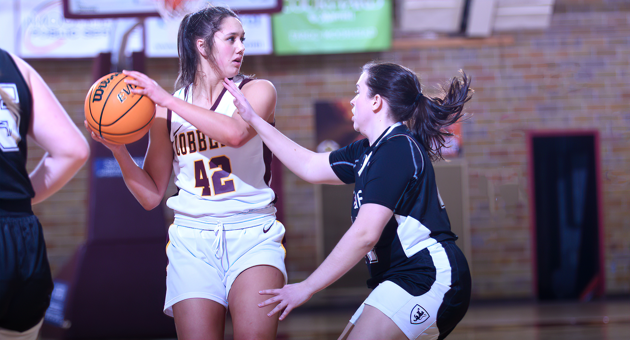 Freshman Makayla Anderson scored 13 points and grabbed 11 rebounds to record her first college double-double in the Cobbers' game at St. Olaf.