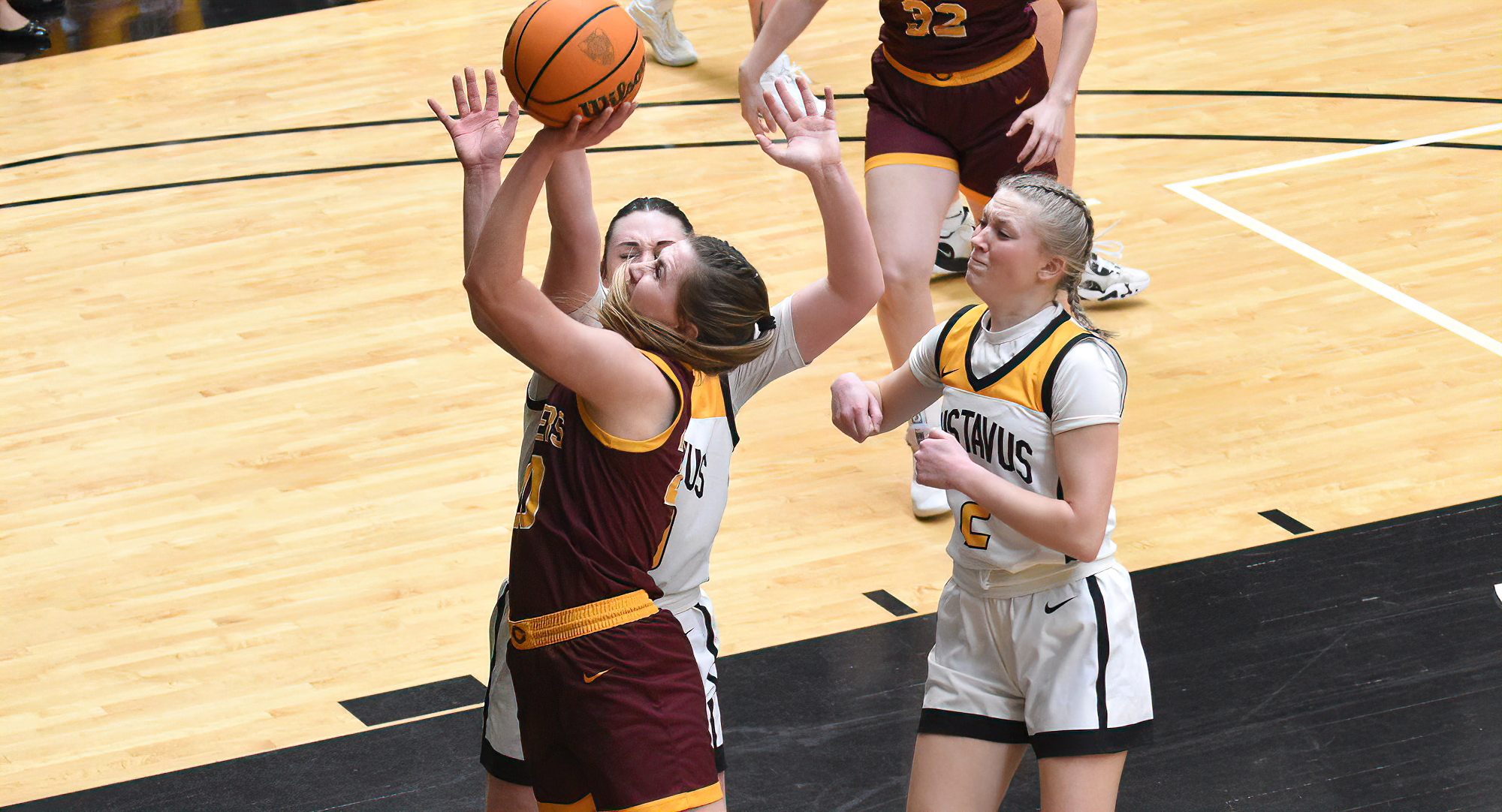 Senior Emily Beseman goes up for two of her team-high 13 points in the Cobbers' MIAC Championship game at Gustavus.