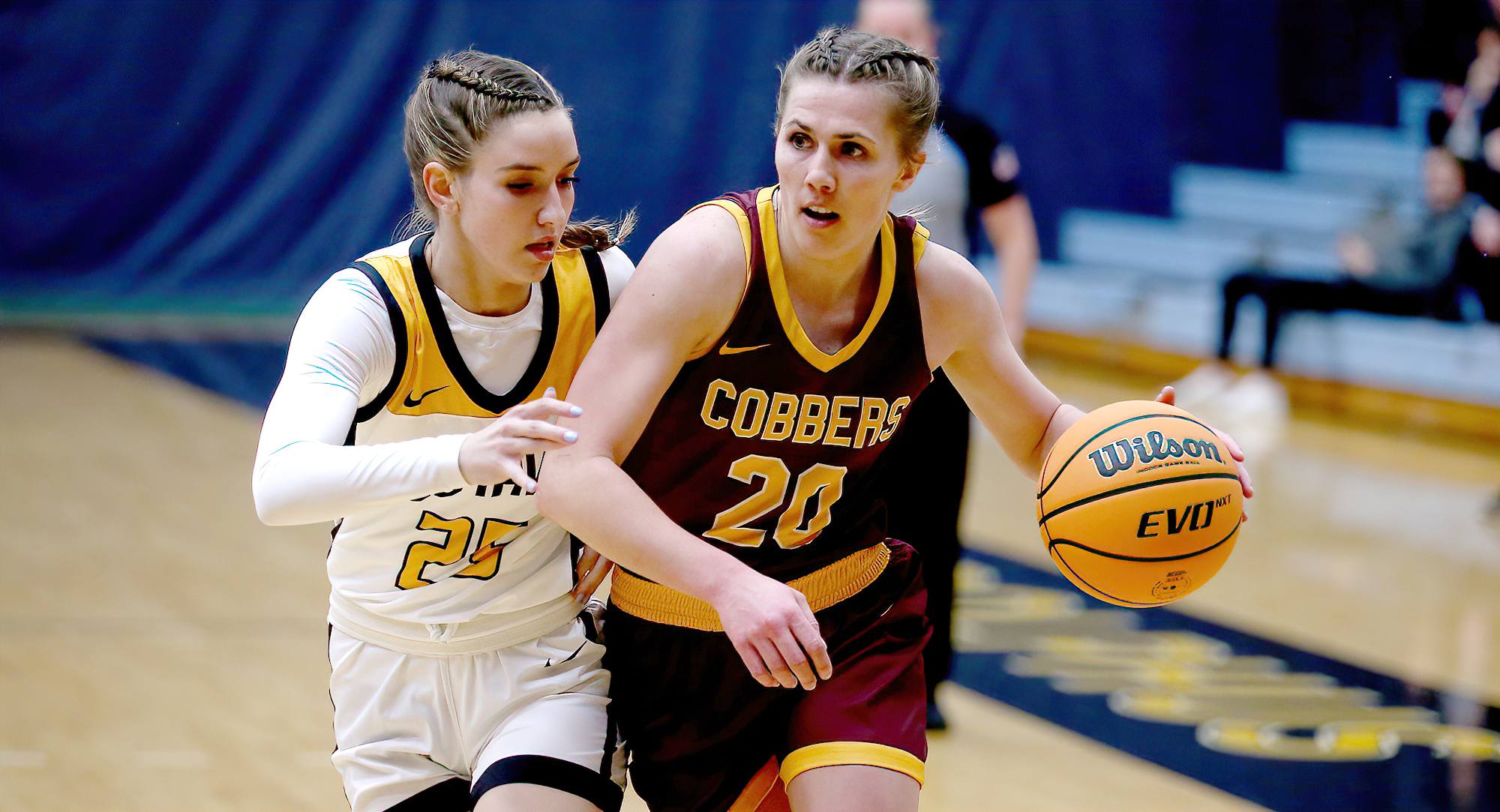 Emily Beseman drives past a Gustie defender in the Cobbers' game at #8 Gustavus. (Photo courtesy of Ryan Coleman, D3photography.com)
