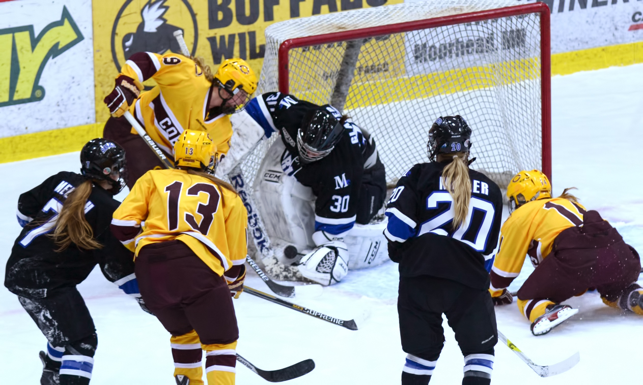 Junior Amber Schaack tries to jam the puck past the Marian goalie in the Cobbers' loss against the Sabres.