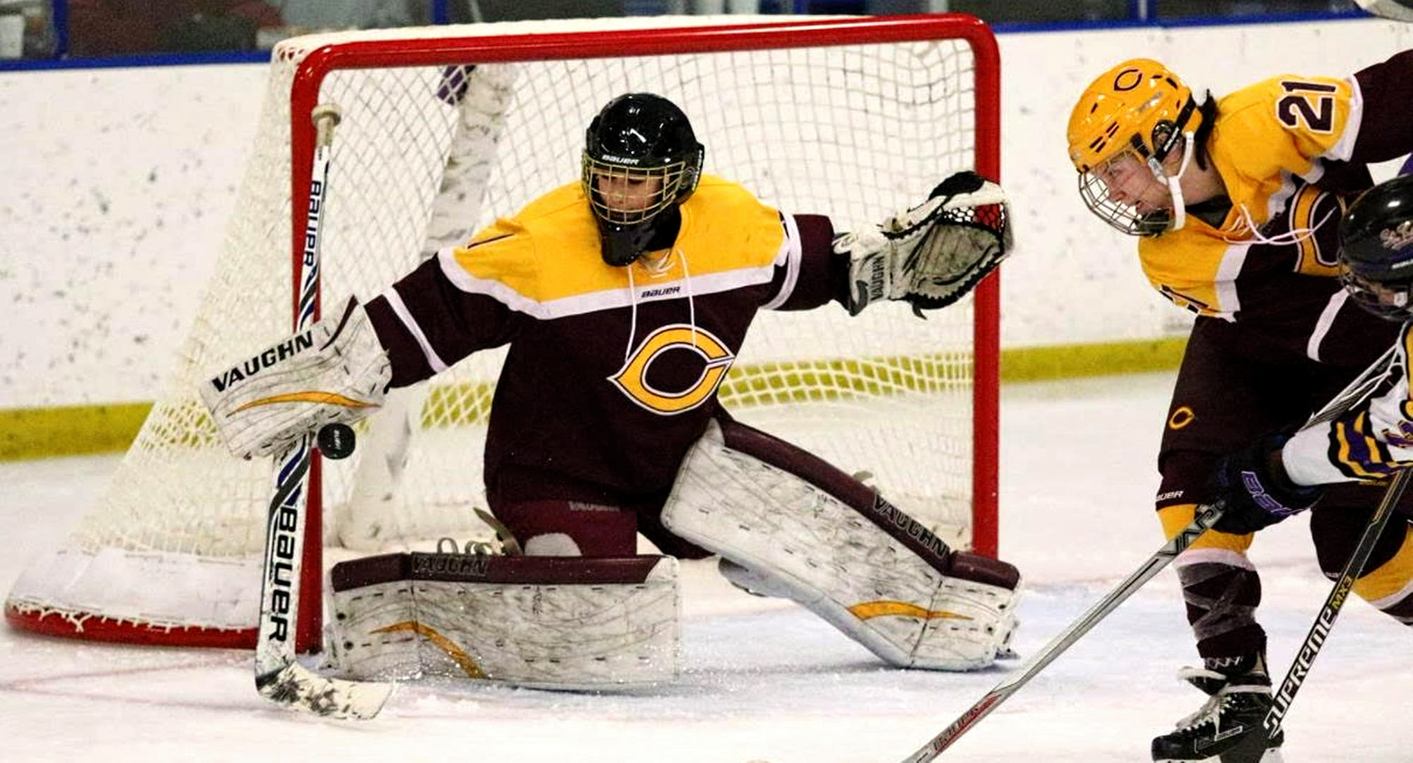 Goalie Andrea Klug makes one of her 25 saves in Concordia's 2-1 win at St. Catherine. (Photo courtesy of Ryan Coleman and D3photography.com)