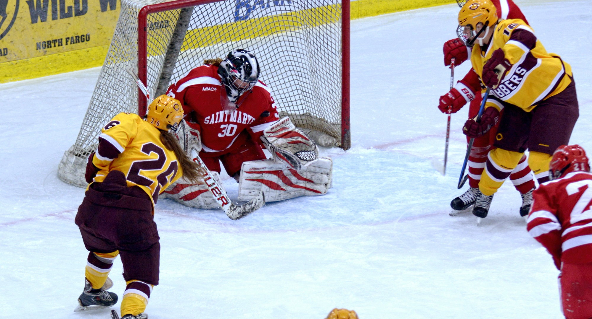 Tori Davis fires a puck on the St. Mary's goal during the third period of the Cobbers' 2-0 win over the Cardinals. Davis had both of the goals for CC.
