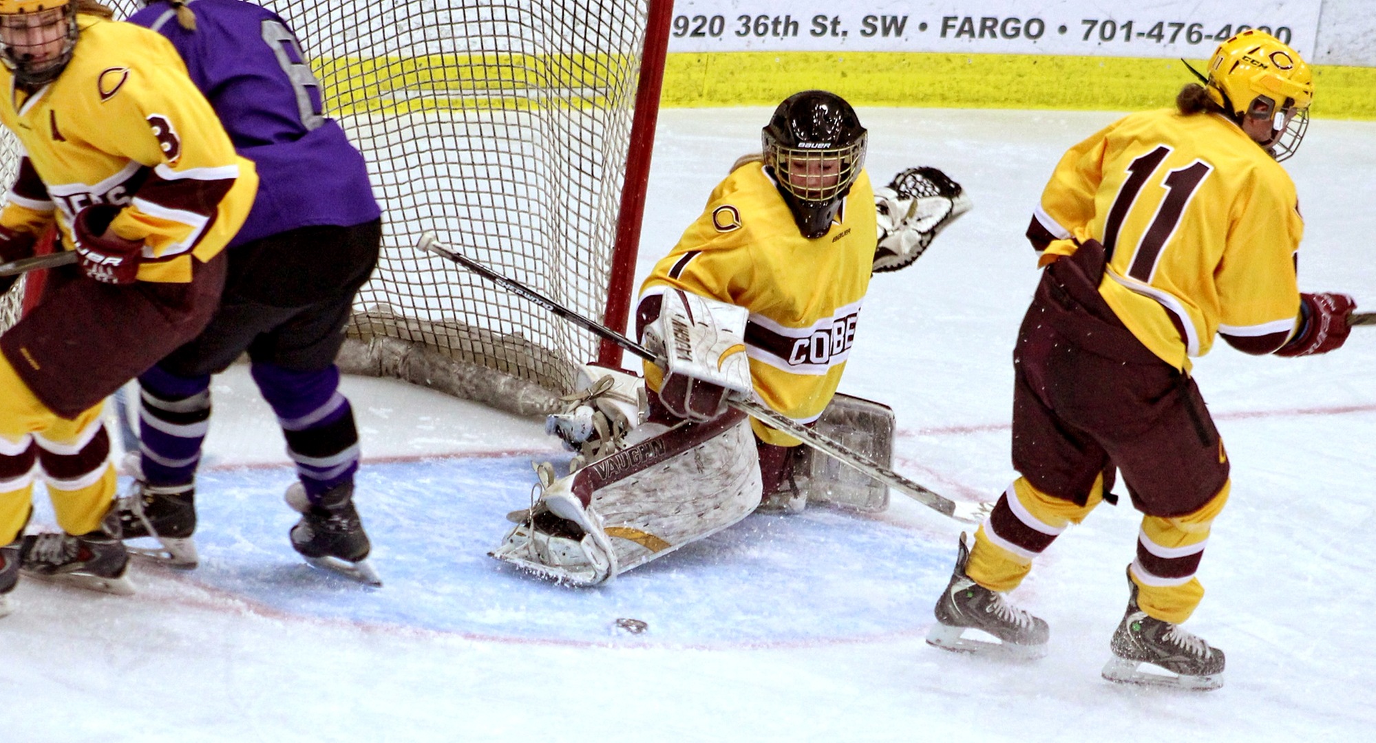 Senior goalie Andrea Klug makes one of her 35 saves in the Cobbers' game with St. Thomas. Klug now has 491 saves on the year which is second most in all of Division III.