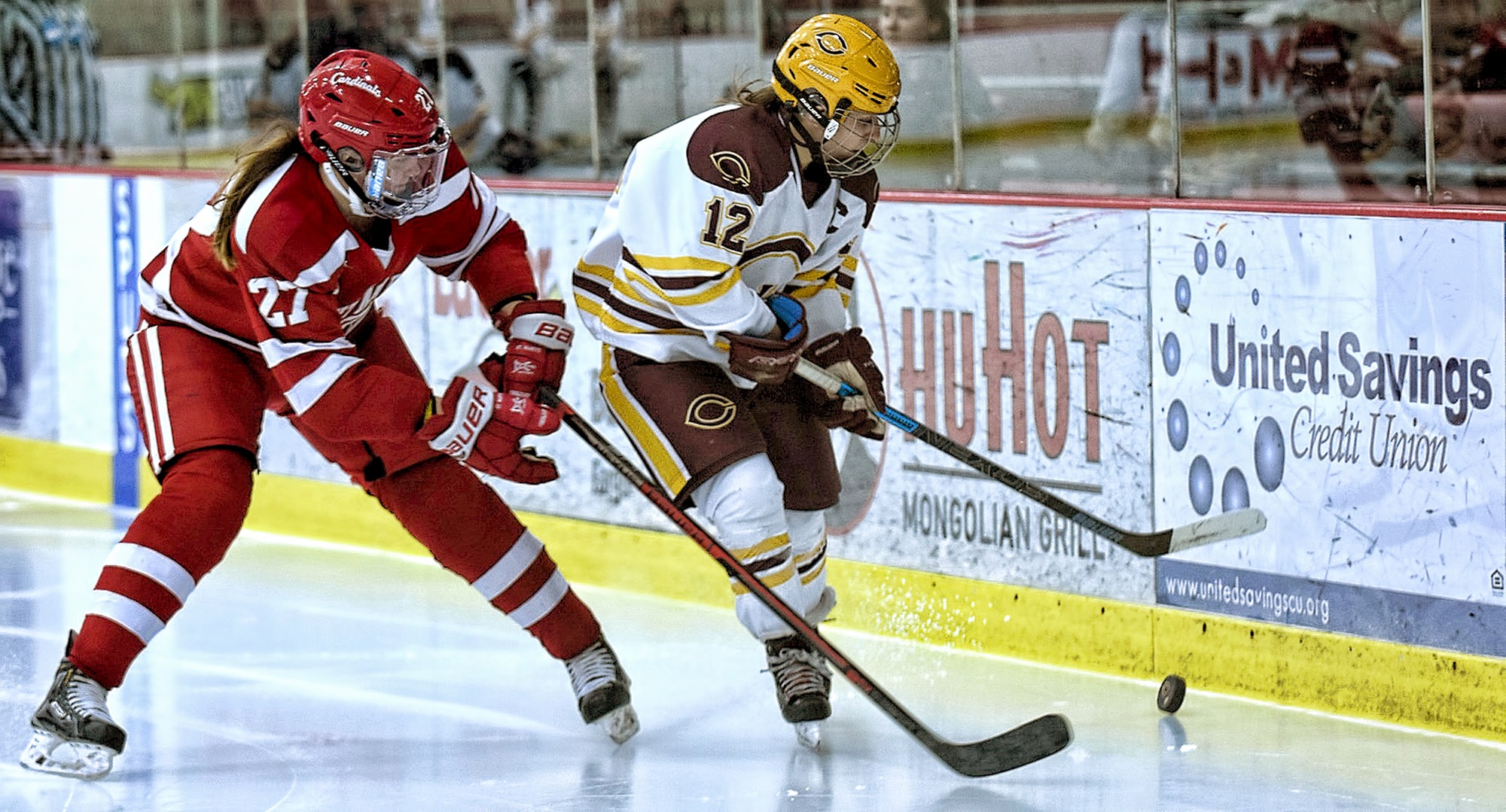 Senior Megan Dondelinger carries the puck into the St. Mary's zone during the Cobbers' 2-1 OT loss. Dondelinger had the only CC goal in the game.