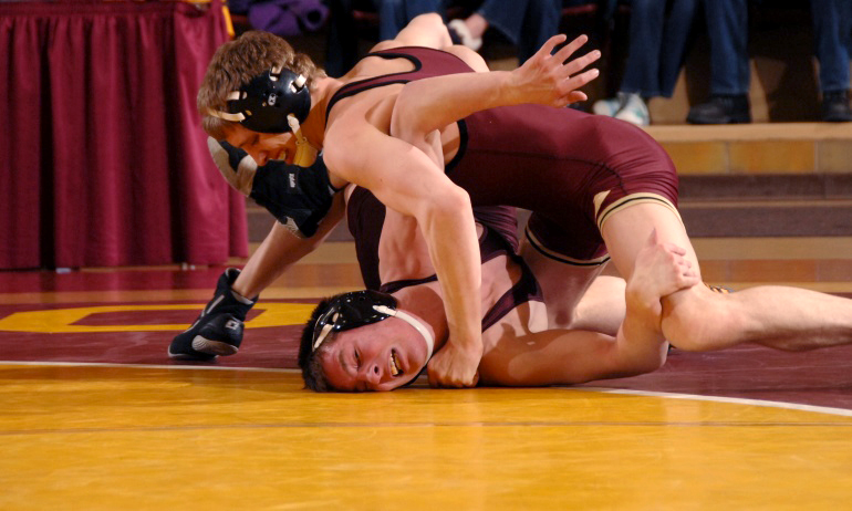 Cobber senior #5 Jacoby Bergeron won his 16th straight match in CC's 51-3 win over St. Olaf.