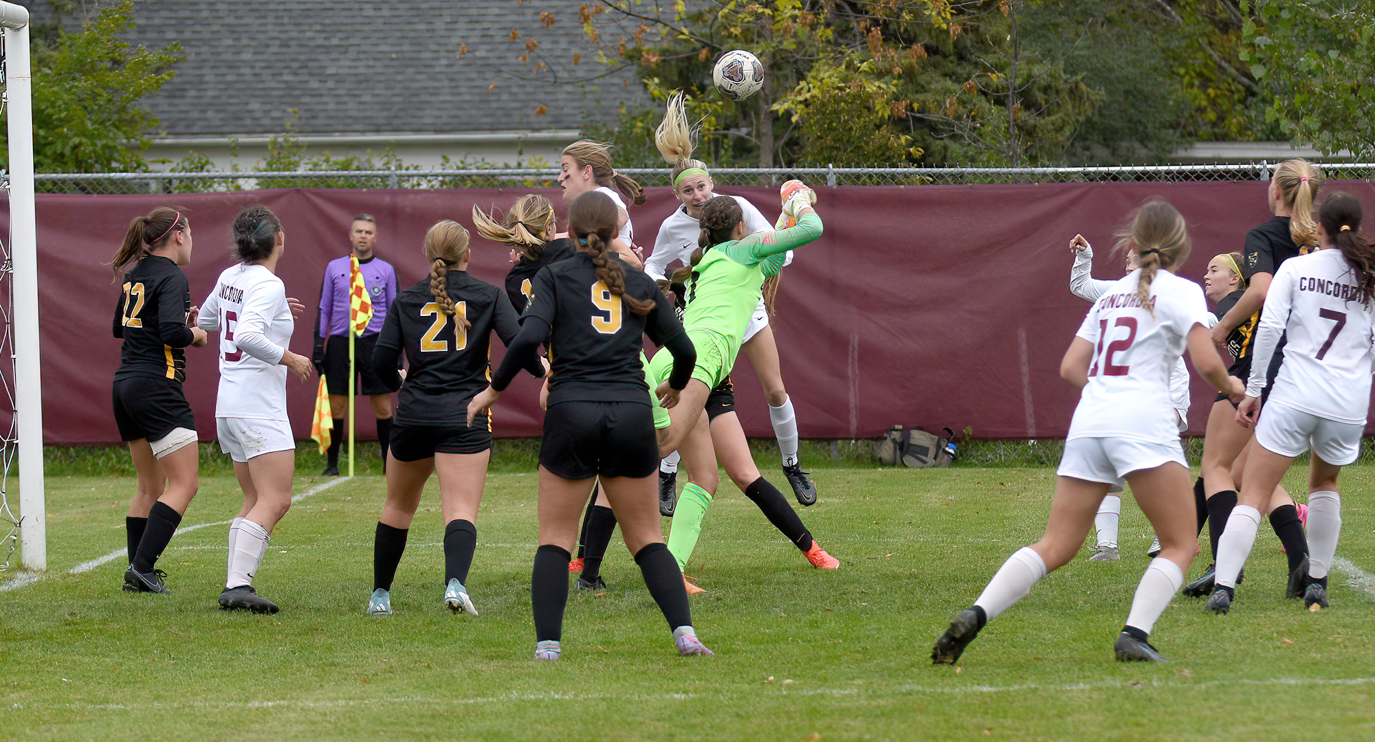 Cobber attackers go up to try and win the ball on a corner kick in their game with Gustavus.