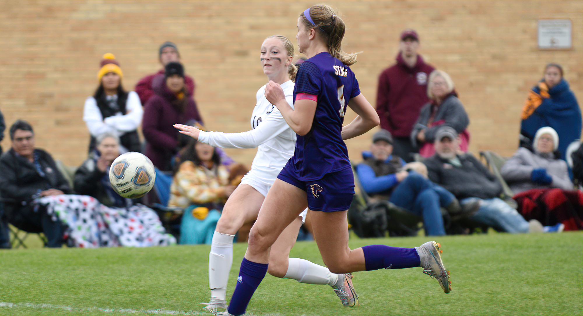 Emma Sheflo lets loose with the shot that gave the Cobbers a 1-0 lead in their battle with regionally-ranked St. Catherine.