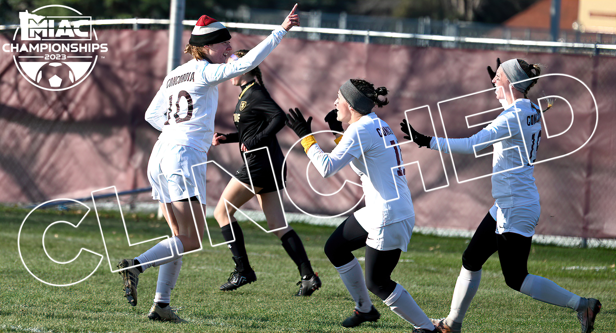 Grace Mork (L) celebrates her first college goal which helped the Cobbers clinch its first MIAC playoff berth since 2015.