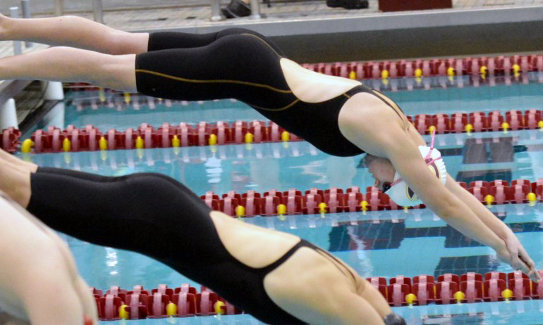 One of Cobbers who set a PR in the 500-yard freestyle gets off to a quick start at Day 1 of the MIAC Meet. (photo courtesy of Matt Higgns)