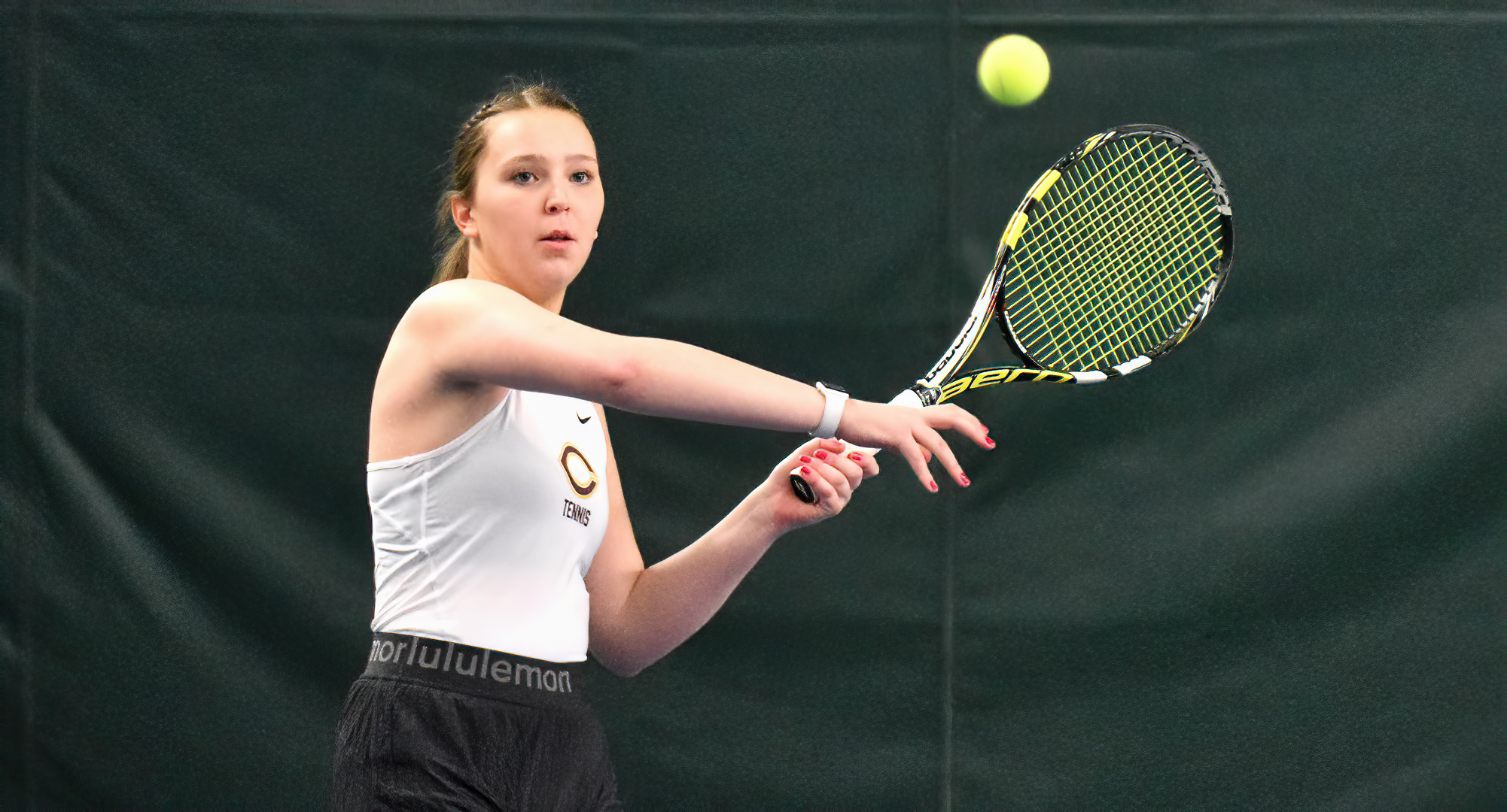 Freshman Kathleen Thompson gets ready to hit a forehand during her No.6 singles match in the Cobbers' 9-0 win against Crown.