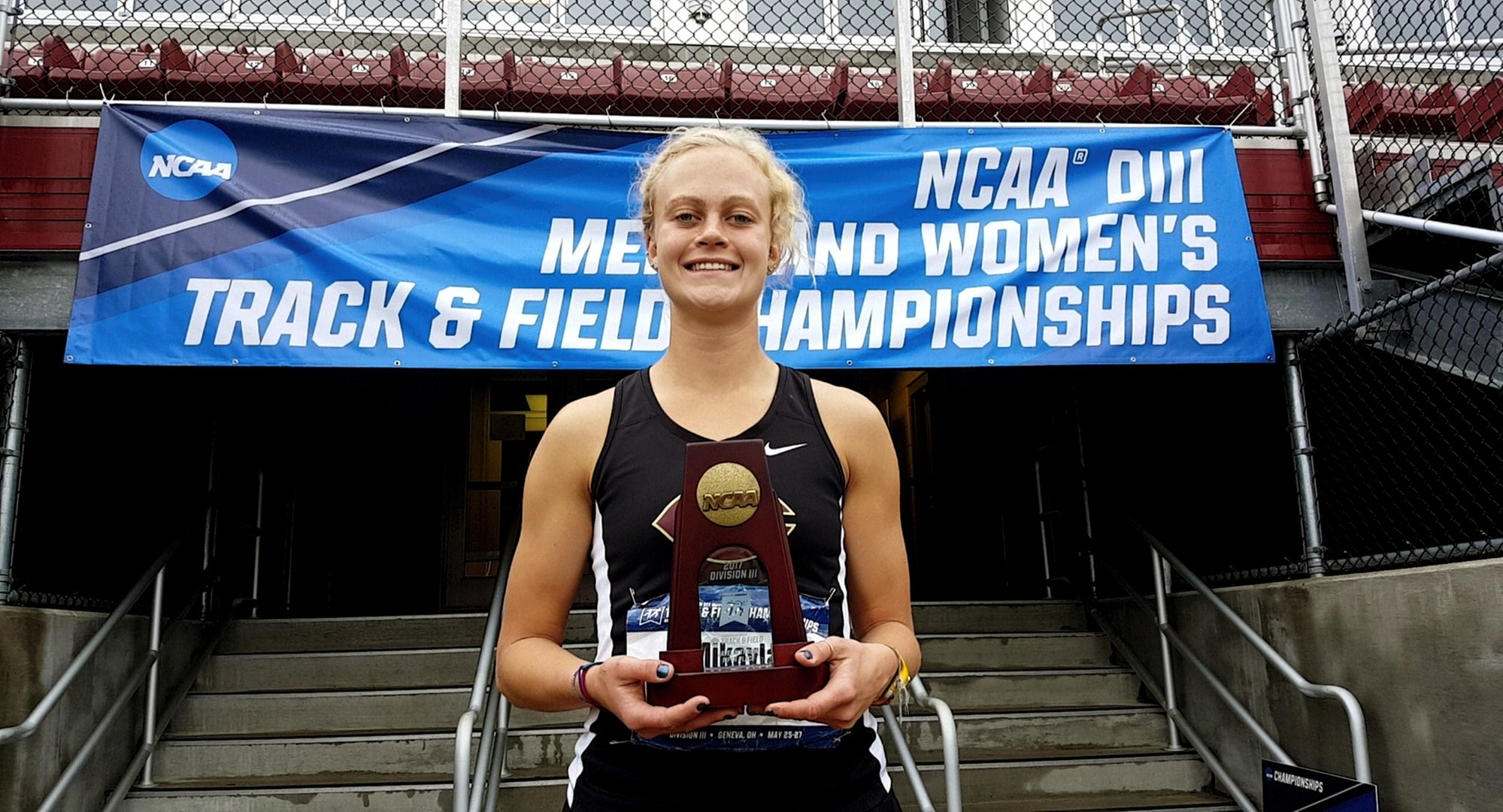 Senior Mikayla Forness poses with her All-American award which she earned in the javelin at the NCAA National Outdoor Meet.