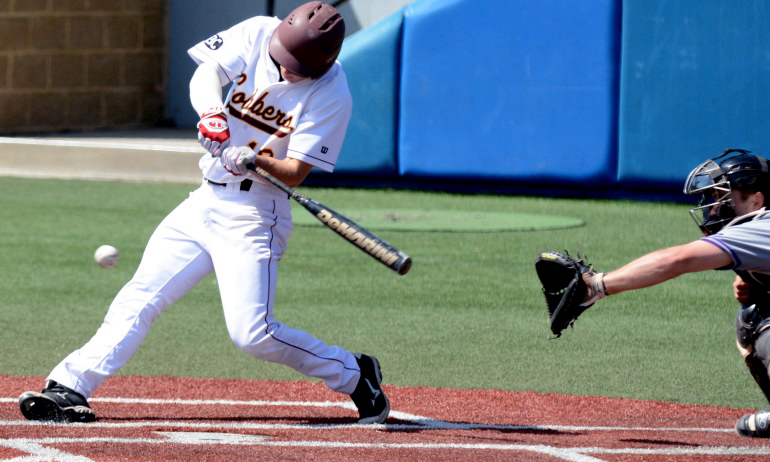 Devin Johnson connects on one of his five hits on Saturday. He finished the MIAC Tournament by hitting .600 with 5 RBI.